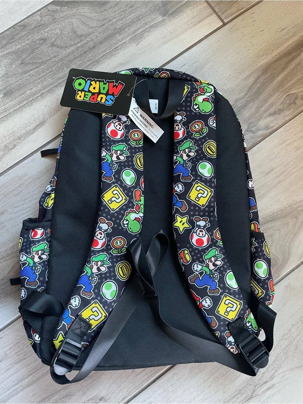 Nintendo Black Kids Backpack with Multicolor Mario Print and Red Trim
